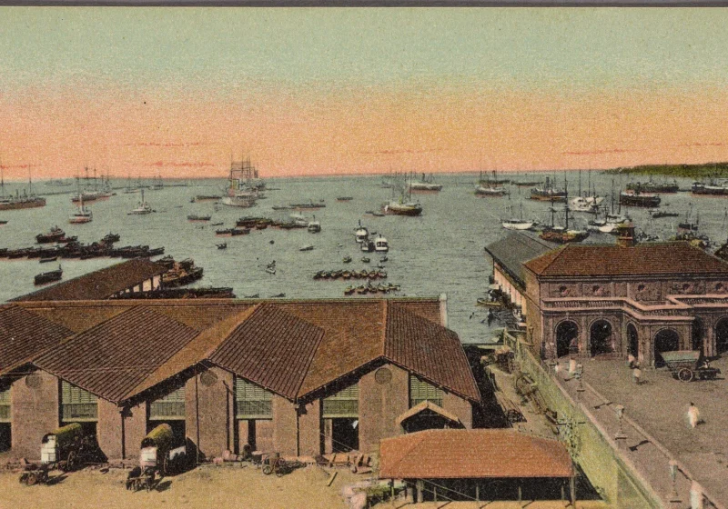 Colombo harbour with warehouses, sailing ships and steamers, from a hand-coloured postcard of 1907